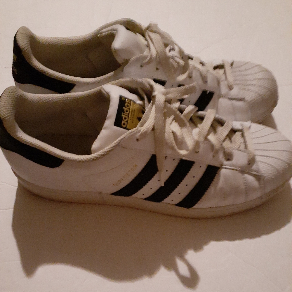 White Adidas Superstar shoes